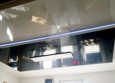 Серый натяжной потолок с голубой подсветкой НП-1830